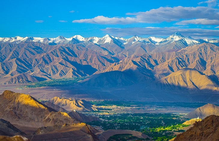 Beautiful scenery, sights and landscapes that can be seen by tourists and travelers in Ladakh, Union Territory in India, The town of Leh from Khardung La Road, in Stok Kangri