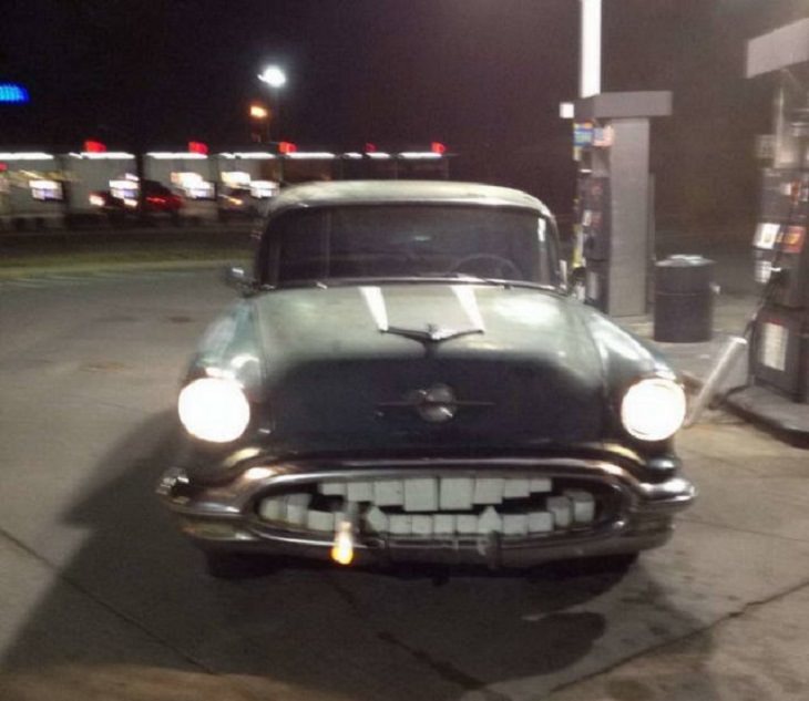 Cars with weird and strange appearances and unique features, car with front bumper painted to look like teeth, with a cigar