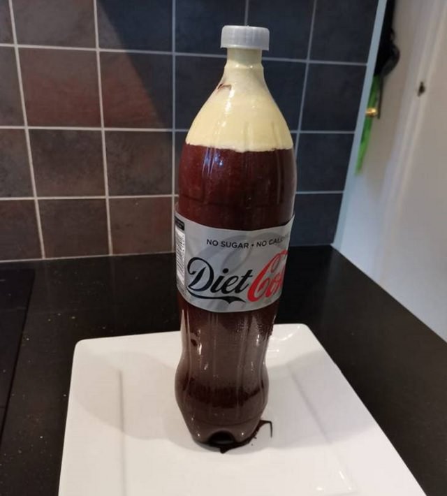 Interesting and creatively designed cakes that look too realistic to eat, cake resembling a large bottle of diet coca cola (coke)