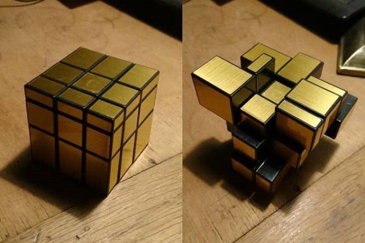 Ordinary objects with unusual appearances or designs, A Gold Rubix Cube with different shapes instead of colors