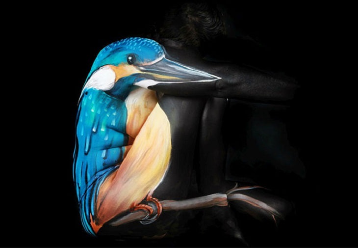 Beautiful works of body art which are painted to give the illusion of things in nature and the world, Gesine Marwedel, blue bird