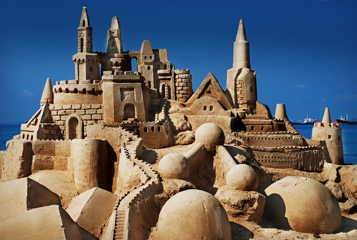 Beautiful, realistic, detailed sandcastles and structures sculpted by professional artists in sand