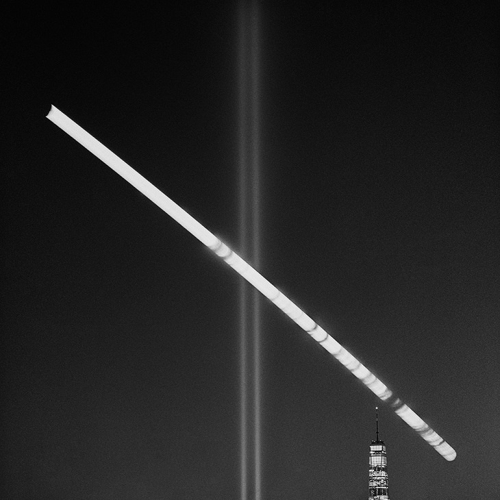 Winners of the 2019 Monochrome Photography Competition, 3rd Place Winner, Landscapes Discovery of the Year, Amateur, MOONSET OVER THE 9/11 MEMORIAL LIGHTS, By Lucjan Gorczynski from the United States