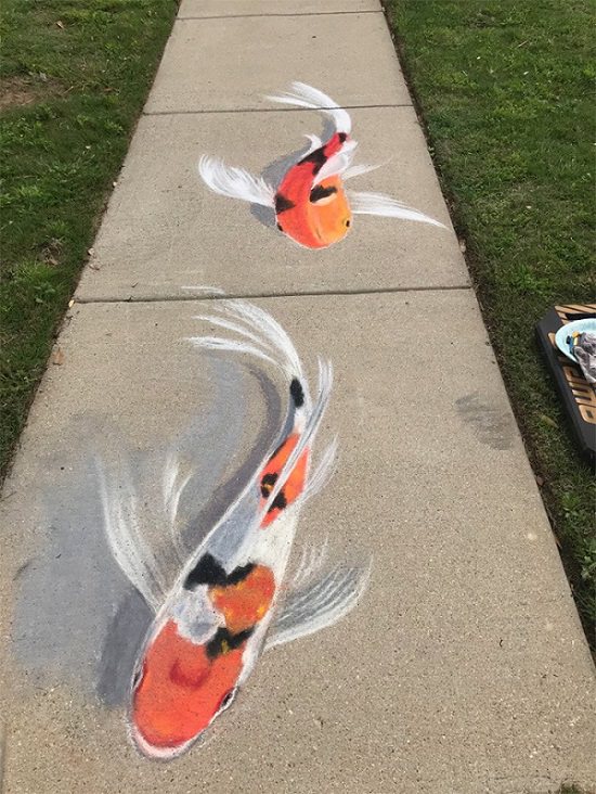 3-D chalk art by Jan Riggins and her teenage daughter Olivia, koi fish