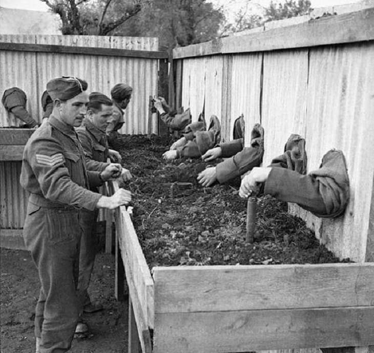 Incredible moments in historical captured on camera, important historical photographs, Members of the British Army’s Corps of Royal Engineers, also known as British Sappers, being trained to defuse mines blindly so they can do so in the dark when necessary, in 1943