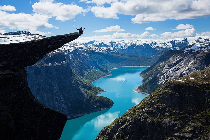 Sights from the popular hiking trail to the rock formation and cliff Trolltunga, near the town of Odda in Norway, View of Ringedalsvatnet lake from Trolltunga Cliff