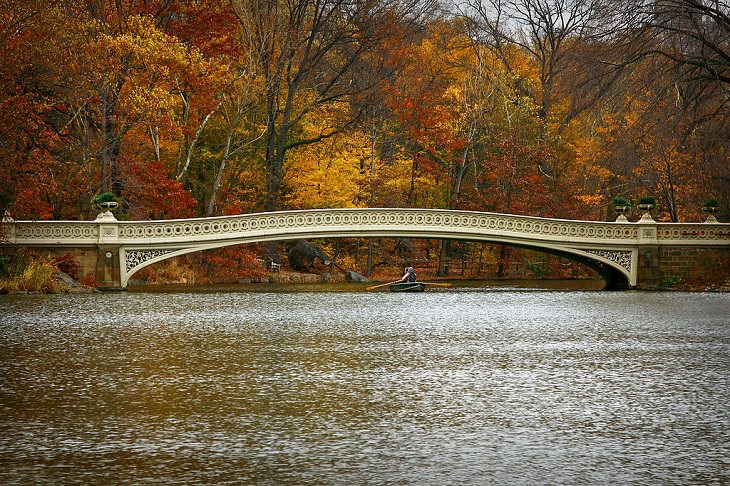 Buildings, attractions, statues, monuments, tributes and memorials found in New York City’s Central Park, Bow Bridge (originally Bridge No. 5), which is located in the southern section of Central Park’s lake, and is one of 39 bridges in the Park