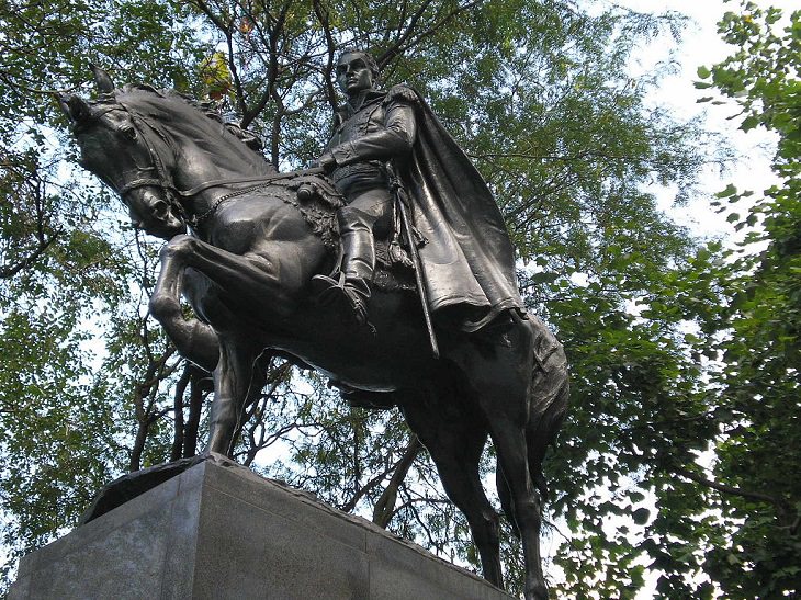Buildings, attractions, statues, monuments, tributes and memorials found in New York City’s Central Park, Simón Bolívar Monument (the Equestrian statue of Simón Bolívar), located in Bolivar Plaza, Central Park South, at the intersection of 59th Street and 6th Avenue