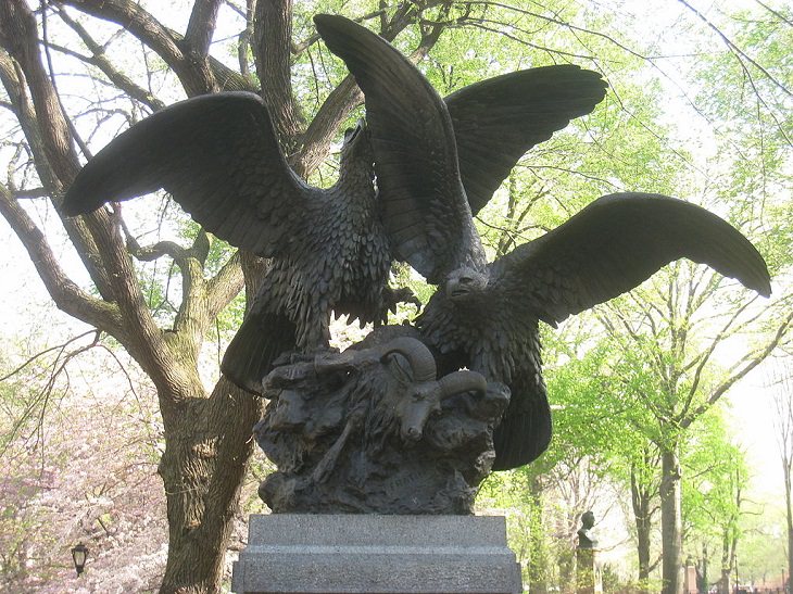 Buildings, attractions, statues, monuments, tributes and memorials found in New York City’s Central Park, Eagles and Prey, located in Center Drive, opposite Lilac Walk