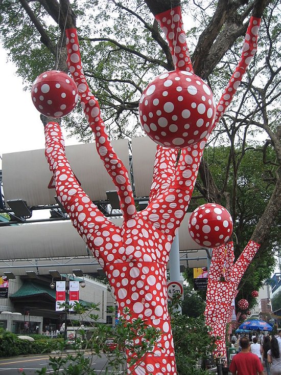 Paintings, artwork, installations and exhibitions created by Yayoi Kasuma, 91 year old Japanese Abstract Impressionist Artist, Ascension of Polka Dots on the Trees at the Singapore Biennale on Orchard Road, Singapore, 2006