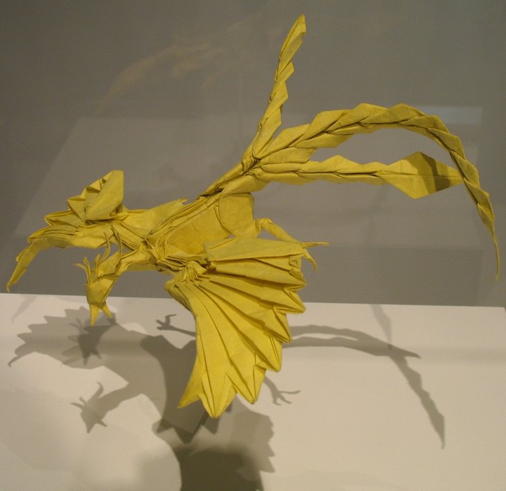 Origami animals, real and mythological, designed by Japanese origami expert Satoshi Kamiya, three-tailed phoenix