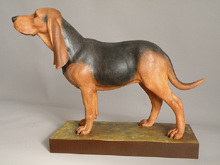 Realistic Animal Sculptures carved out of wood by woodworking Italian artist Guiseppe Rumerio, hound, dog