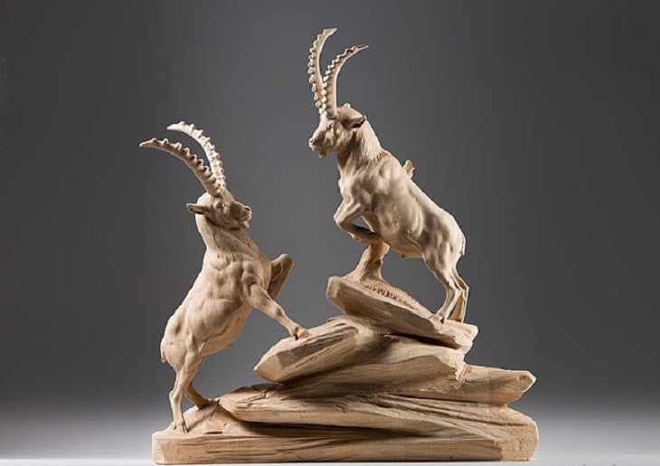 Realistic Animal Sculptures carved out of wood by woodworking Italian artist Guiseppe Rumerio, ibex