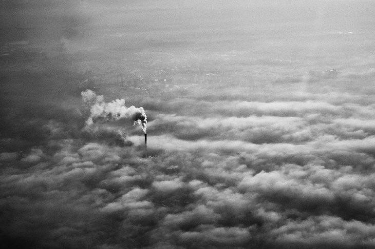 Winning Photographs from International Photography Awards One Shot: Climate Change, Category: Air, 2nd Place: Above the Clouds, By Barbara Zanon