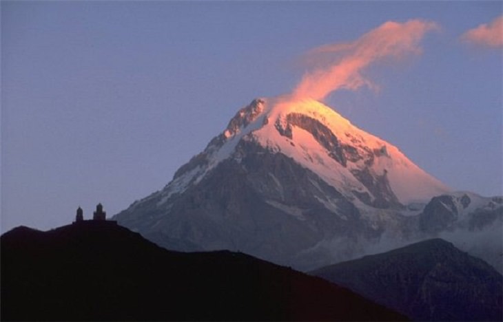 Must-see places in The Caucasus in Europe, Mount Kazbegi (Kazbek), a dormant stratovolcano on the border of Georgia and Russia