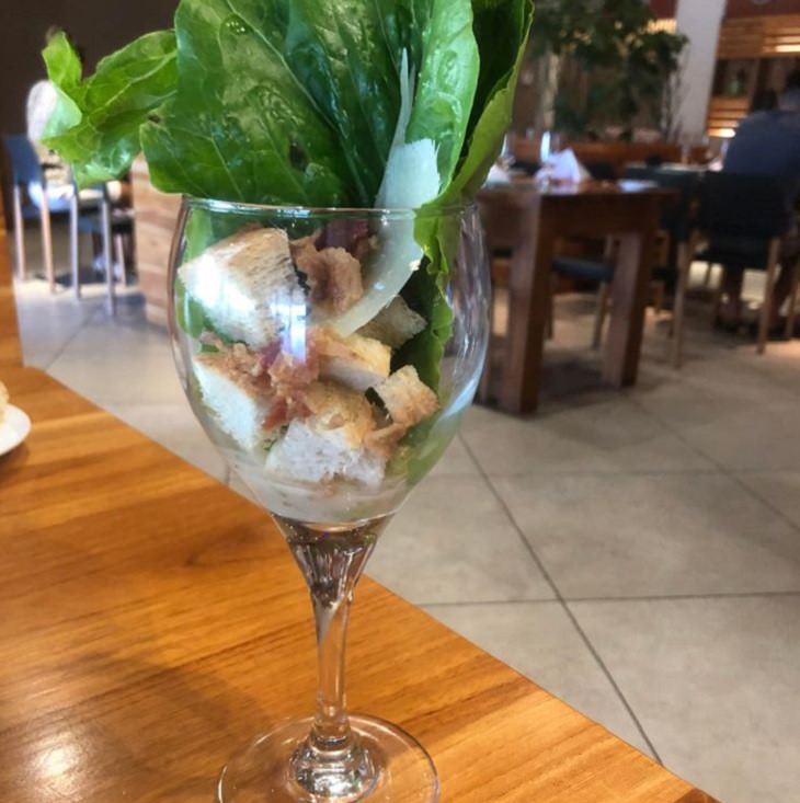 Hilariously creative replacements for plates, Caesar salad served in a wine glass 