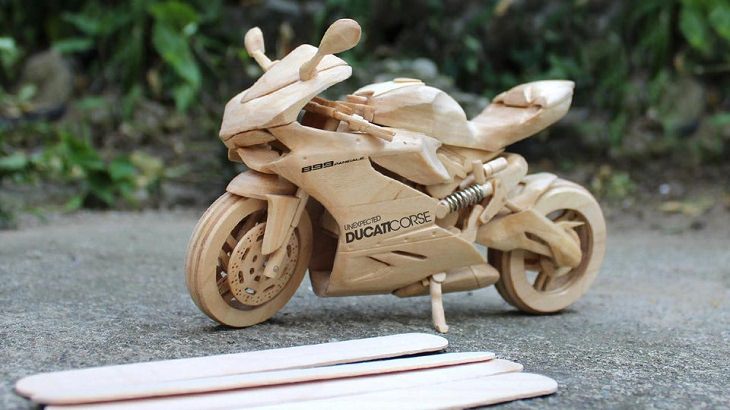 Beautiful artistic creations made by humankind and civilization over time, A miniature model of a motorcycle made only from popsicle sticks