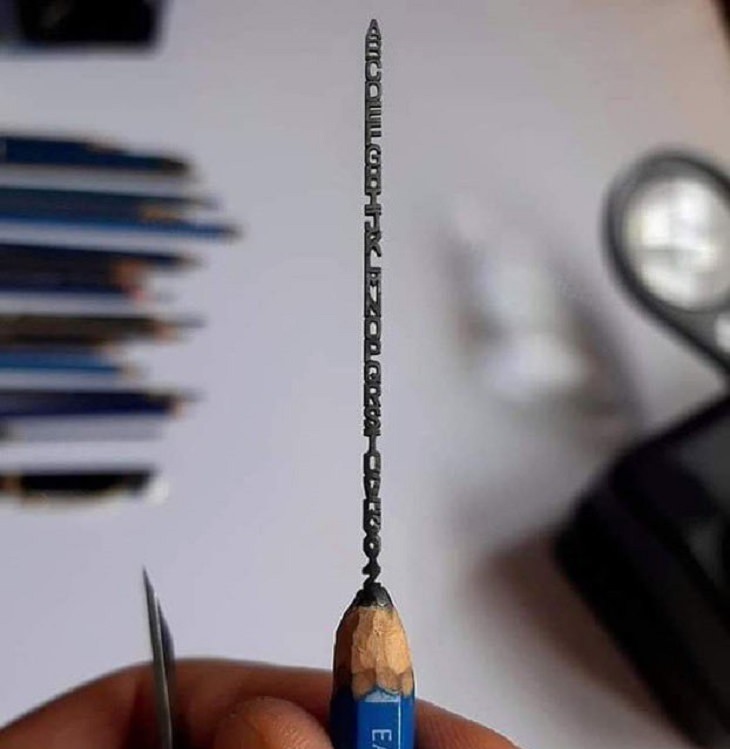 Beautiful artistic creations made by humankind and civilization over time, The tip of this pencil has the entire alphabet carved into it