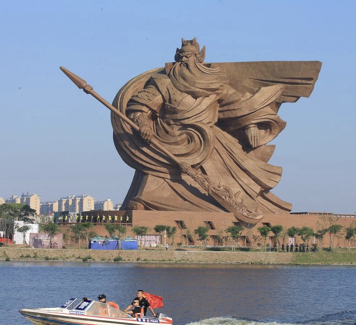 Beautiful artistic creations made by humankind and civilization over time, A 190 foot tall, 1200 tonne statue of water god Guan Hu, in Jingzhou, China