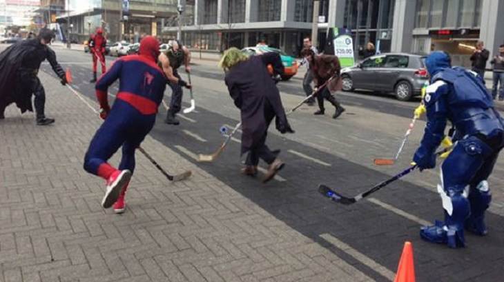 Hilarious pictures that could only be taken in Canada, people in superhero costumes playing hockey on the streets