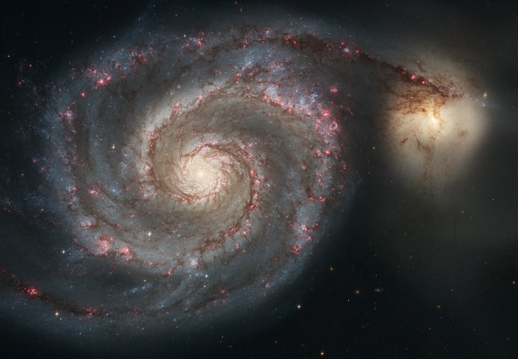 Photo gallery of the most unusual and strangely beautiful galaxies found in the universe and across space, The Grand Whirlpool Galaxy (designated M51, Messier 51 and NGC 5194)