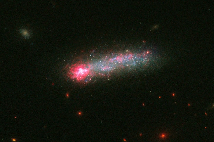 Photo gallery of the most unusual and strangely beautiful galaxies found in the universe and across space, Kiso 5639, a dwarf galaxy that resembles a 4th of July skyrocket