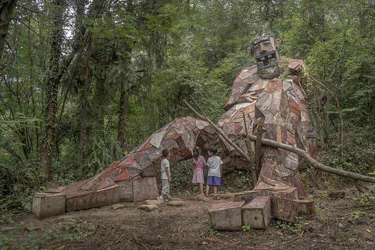 Beautiful, creative, fun and friendly troll sculptures made from recycled wood and garbage by artist Thomas Dambo found all over the world, The Stone Monster, in Wulong, China