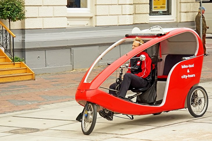 Bizarre, strange, unique and creatively designed taxi cabs found all around the world, Bicycle Taxi, Netherlands