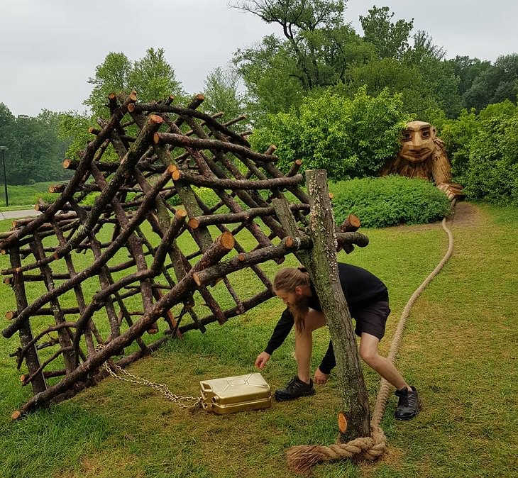 Beautiful, creative, fun and friendly troll sculptures made from recycled wood and garbage by artist Thomas Dambo found all over the world, Sneaky Socks Alexa, in Morton Arboretum, Chicago, USA