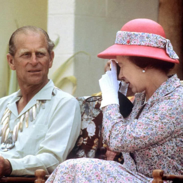 12 Photos to Honor the Memory of Prince Philip  The Queen takes a photograph of the Duke of Edinburgh during their visit to the South Sea Islands of Tuvalu in 1982 