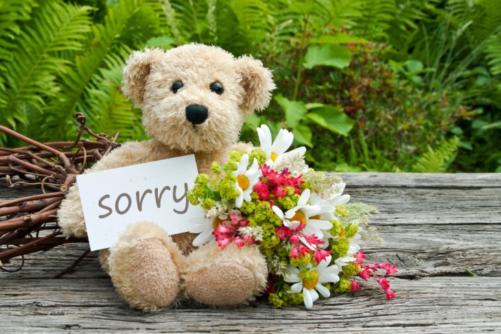 Egoism in Relationships: A teddy bear holding a note that says 'Sorry'