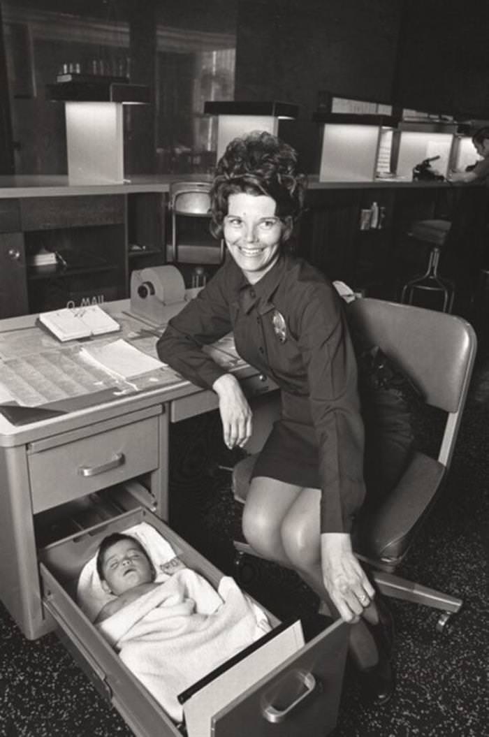 33 strong women A Protective L.A. Police Officer Looks After an Abandoned Baby, Who is Taking a Comfortable Nap Inside Her Desk Drawer! (1971)