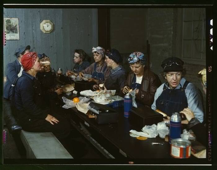 33 strong women Female Railroad Workers Gathering for Lunch. (1943)