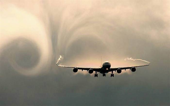 photo of planes in the clouds