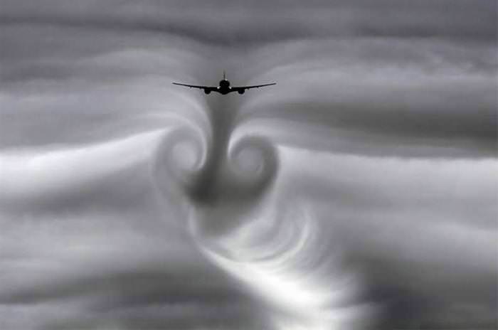 photo of planes in the clouds