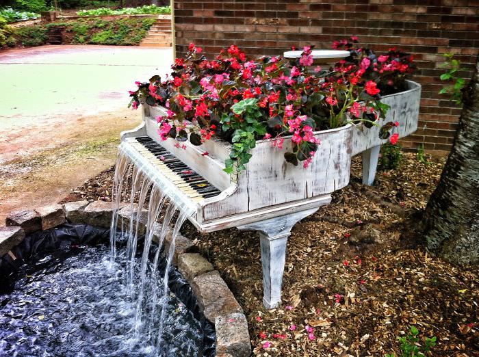 Recycled Furniture piano waterfall in garden
