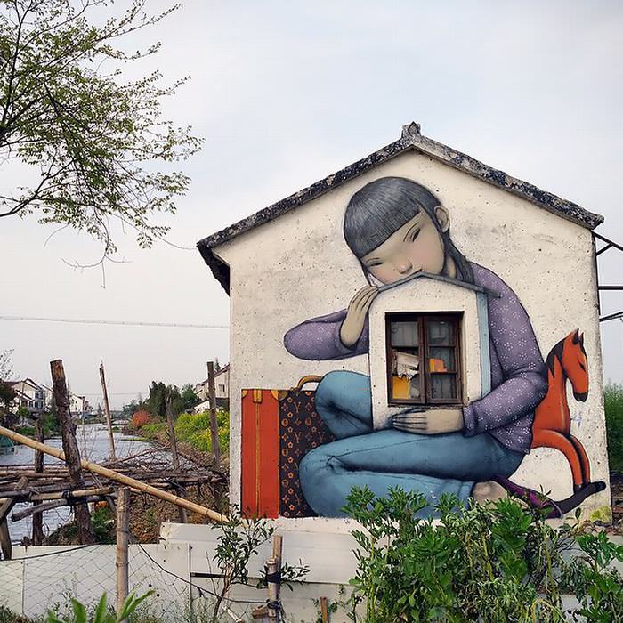 French Street Artist Transforms Ordinary Buildings into Works of Art