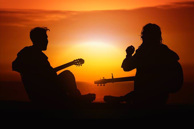 playing guitars at sundown