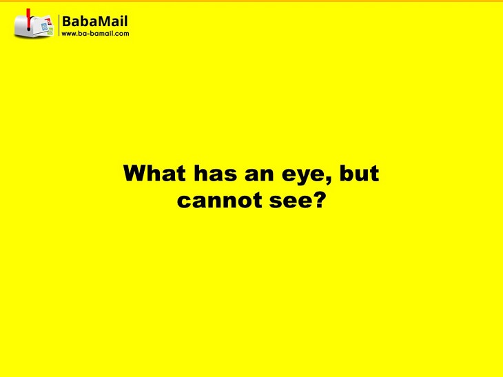 What has an eye but cannot see?