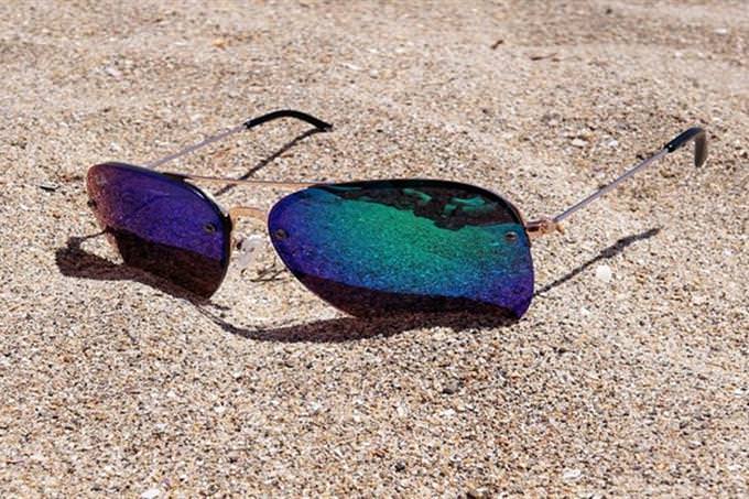 sunglasses on sand