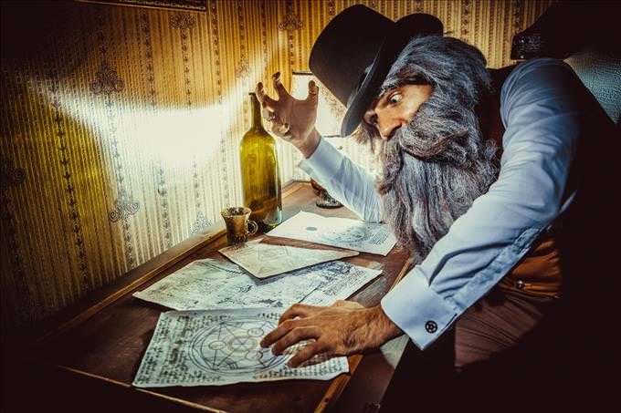 bearded man solving puzzle