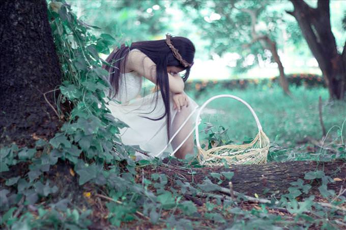 woman crying in woods