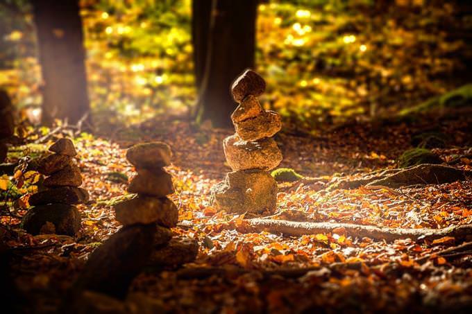 3 piles of stones in a grove