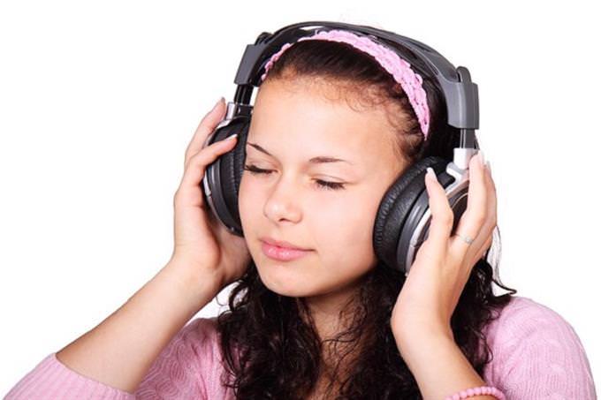 a girl with headphones on