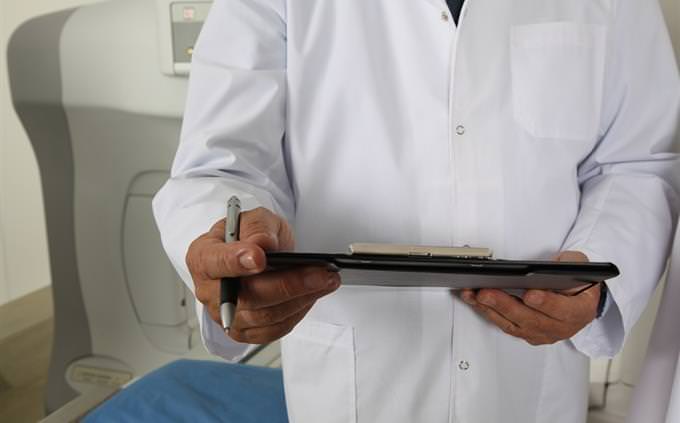 Doctor holding a medical file