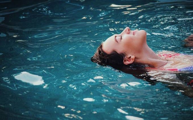 Woman swimming in pool