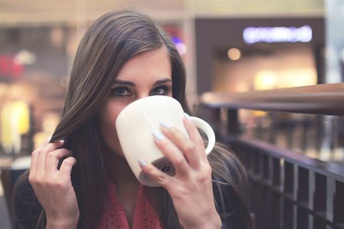 Woman drinking from a cup