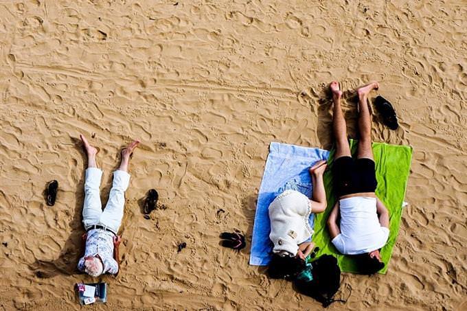 three people at the beach