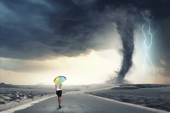 lady with umbrella and tornado