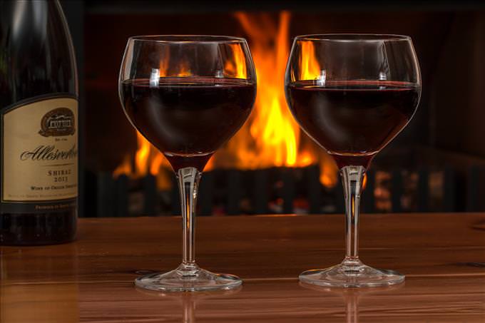 wine glasses by the fire